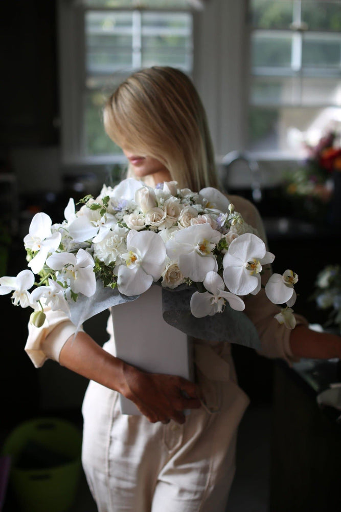 Nella(Arrangement with orchids in tall vase) - Los Angeles Florist - Pink Clover